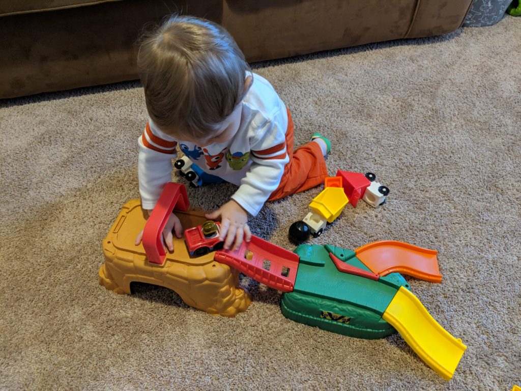This construction themed activity shows Little Man playing with his play-and-go construction site. 