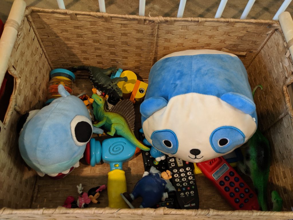 A basket of toys that are always available during my toy rotation system.