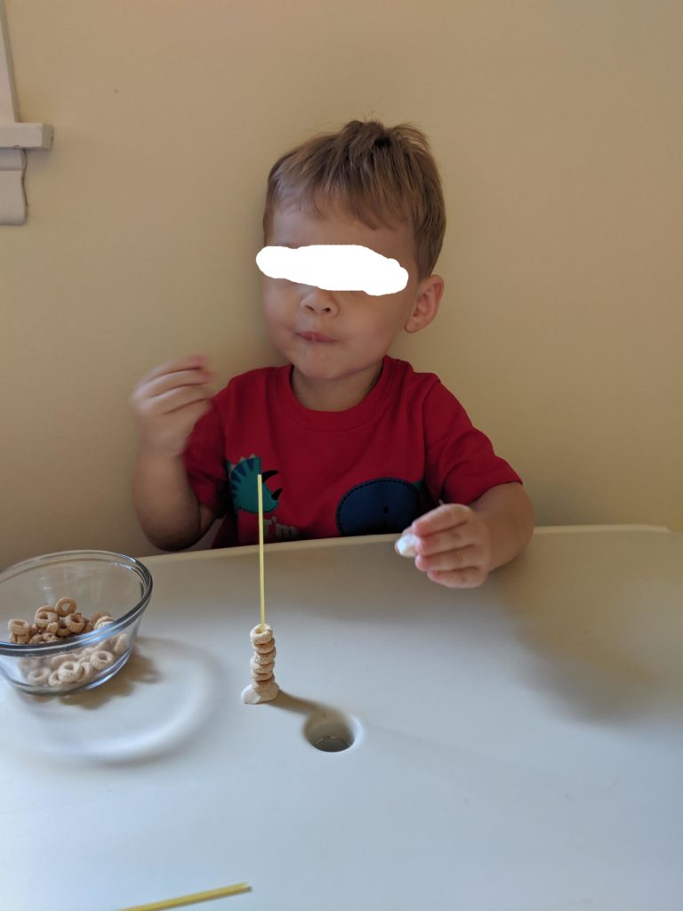 Little Man eating the Cheerios