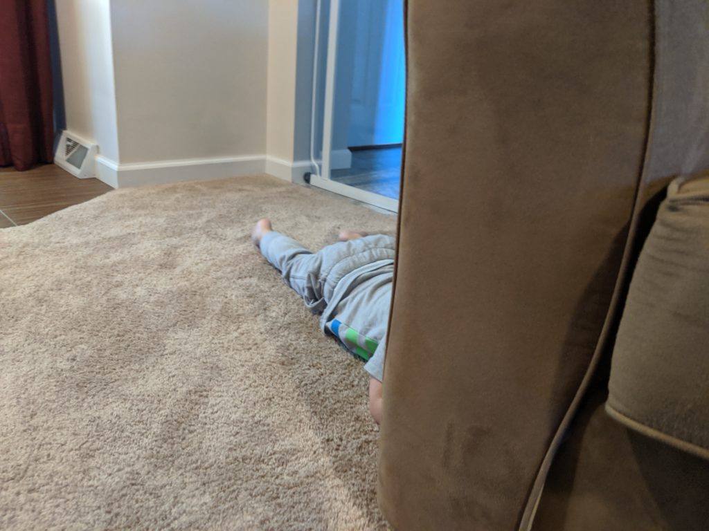 Little Man playing hunt and seek