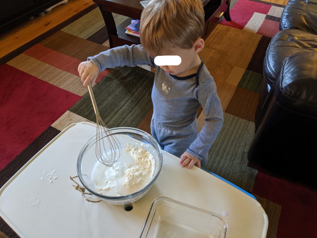 Little Man mixing the oobleck